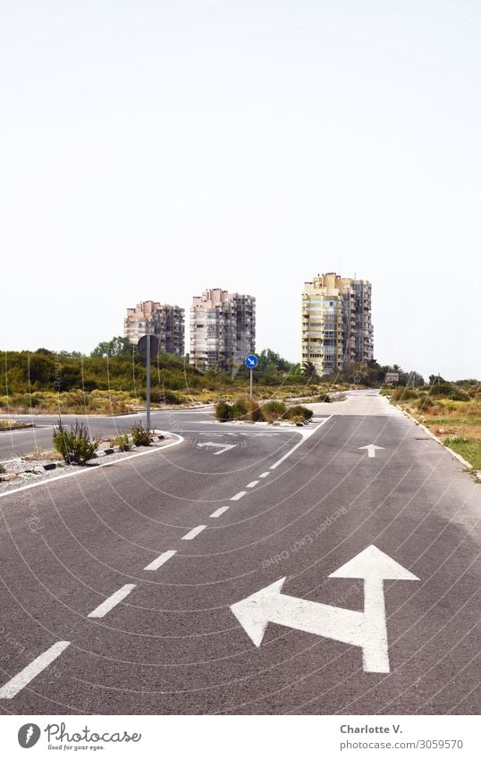 Left or straight? Deserted House (Residential Structure) High-rise Building Apartment house Traffic infrastructure Street Road sign Turn off Concrete Sign