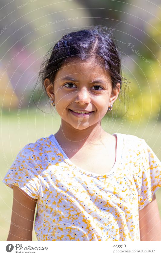 Cute latin girl with yellow flower shirt Lifestyle Style Joy Happy Beautiful Body Hair and hairstyles Face Freedom Summer Child Girl Infancy Skin Eyes 1