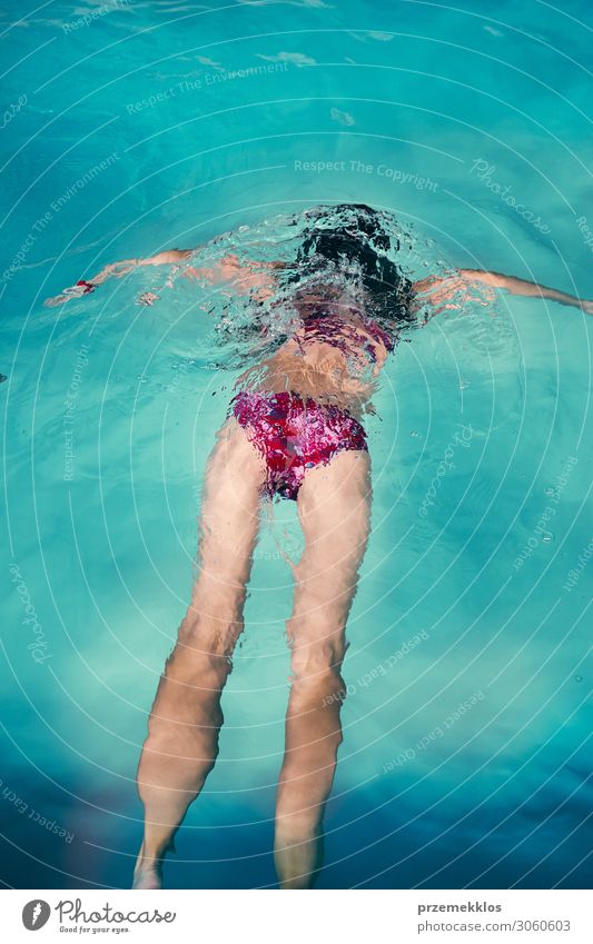 Girl swimming and relaxing in swimming pool Lifestyle Joy Happy Beautiful Body Fitness Wellness Well-being Relaxation Spa Swimming pool Swimming & Bathing