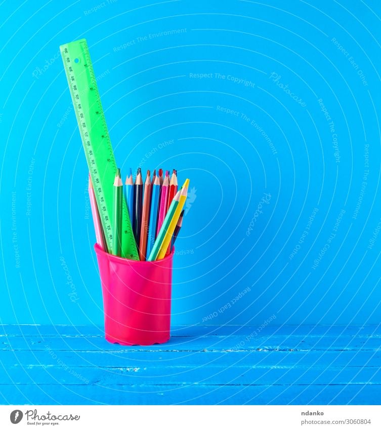 blue stationery glass with multi-colored wooden pencils Table School Classroom Academic studies Workplace Office Pen Draw Blue Colour Idea Creativity