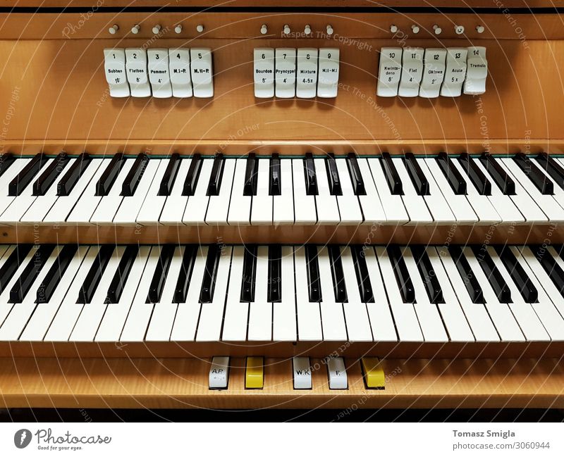 Pipe organ frontal shot, keyboard closeup Art Old Keyboard instrument keys Organ In pairs registers two keyboards Frontal Front view Musical instrument