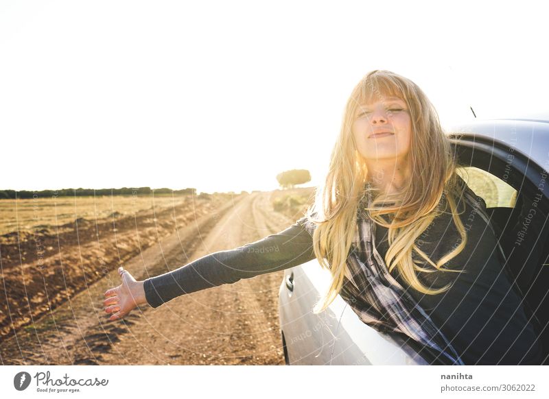 Young woman in a road trip enjoying the journey Lifestyle Style Vacation & Travel Tourism Trip Adventure Far-off places Summer Human being Feminine