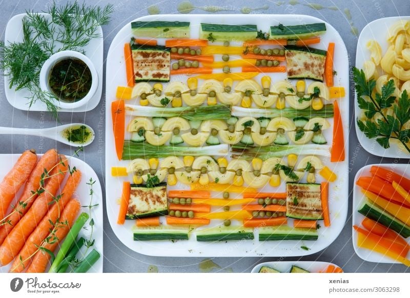 Square pasta salad with fried spring onions and zucchini Lettuce Noodles Food Vegetable Salad Dough Baked goods Herbs and spices Cooking oil Carrot Pepper