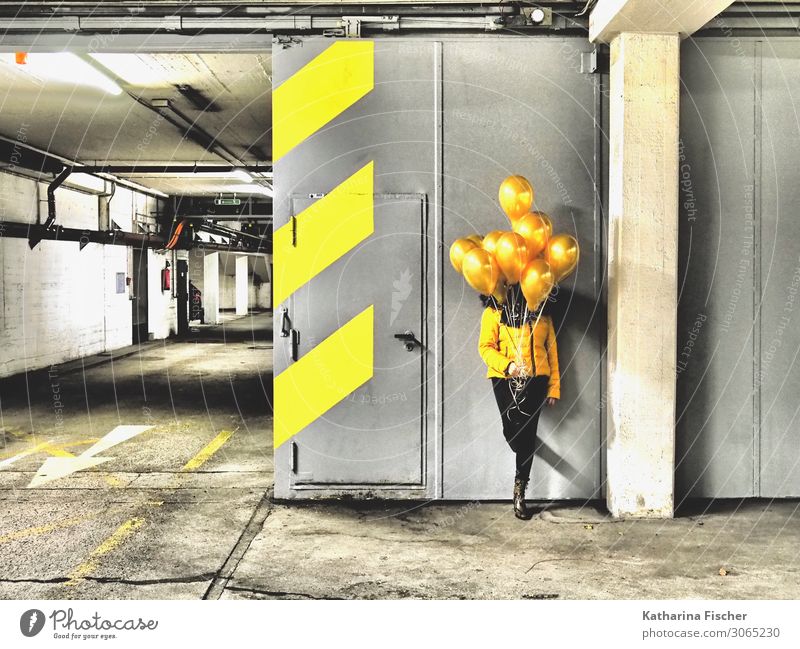 yellow balloons 1 Human being Parking garage Sign Signs and labeling Signage Warning sign Graffiti Stand Illuminate Yellow Gold Gray Black White Garage