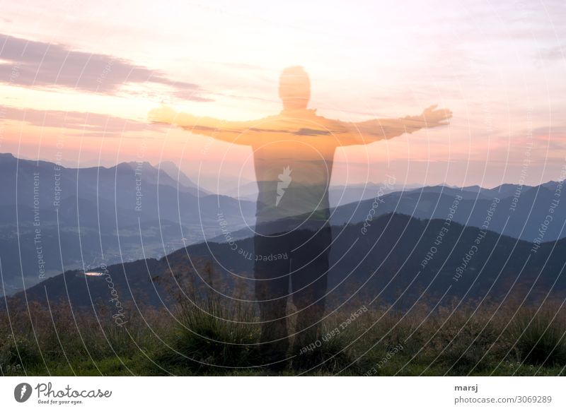 Nebulous appearance at sunrise. Human being Masculine Man Adults 1 Nature Sky Clouds Sunrise Sunset Beautiful weather Alps Mountain Illuminate Exceptional