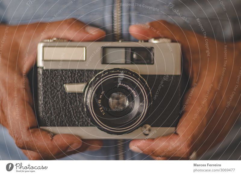 vintage photo camera in hands Lifestyle Beautiful Leisure and hobbies Decoration Camera Technology Human being Adults Hand Metal Old Retro Vantage point frame