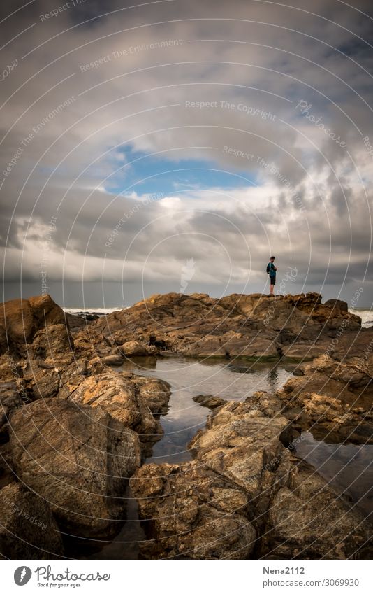 farsightedness Man Ocean Lonely To go for a walk solitaire stones Steinernes Meer Atlantic Ocean Beach Weather Clouds Thunder and lightning Coast Sky