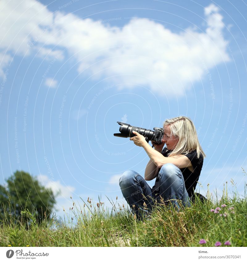 unerring Work and employment Media industry Feminine Woman Adults 1 Human being Artist Camera Objective Sky Clouds Beautiful weather tree Meadow T-shirt Jeans