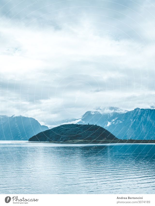 Little hill on a river mountain lake blue landscape patagonia nature exterior argentina peace