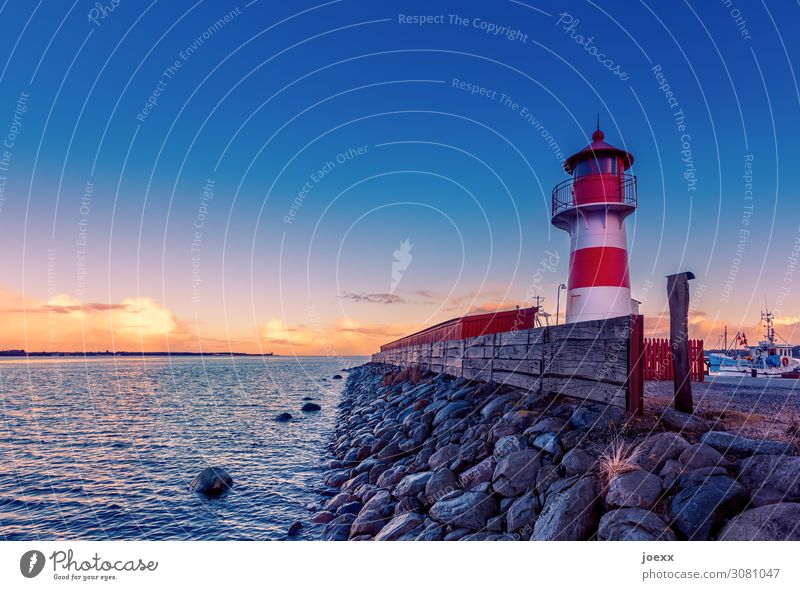 Small lighthouse red-white in Denmark Wide angle Deep depth of field Sunlight Twilight Evening Deserted Exterior shot Multicoloured Colour photo Idyll Horizon