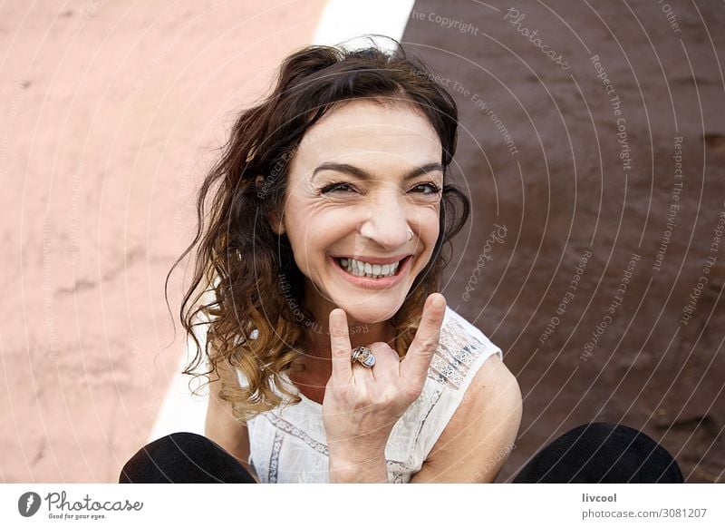 Adult woman gesturing in front of a pink wall , San Sebastian Lifestyle Happy Beautiful Face Relaxation Calm Human being Feminine Woman Adults Female senior 1