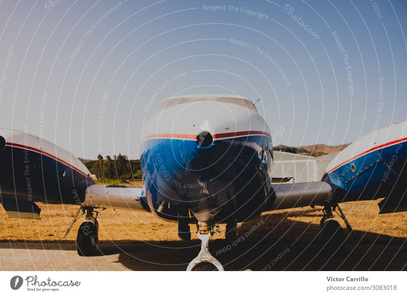 A vintage aircraft in an airport Aviation Airplane Biplane Aircraft Airport Airfield Experience Kitsch Competent Colour photo Multicoloured Exterior shot