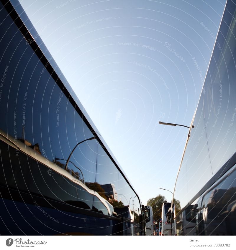 about to start | on the road again Sky Beautiful weather Hamburg Downtown Street lighting Transport Passenger traffic Public transit Bus travel Bus terminal