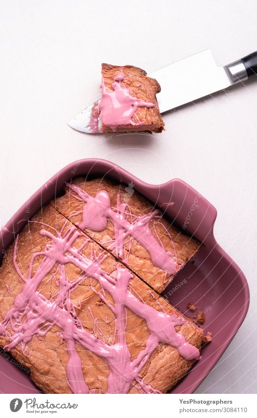 Pink chocolate brownie in a tray on white table Cake Dessert Candy Chocolate Pot Pan Good Red Tradition above view Baking Bakery belgian chocolate brownie day