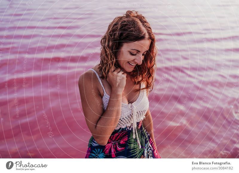 portrait of young beautiful woman by a pink water lake Lifestyle Happy Beautiful Relaxation Leisure and hobbies Vacation & Travel Tourism Summer Beach Ocean