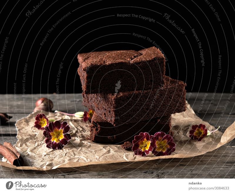 stack of baked square pieces of chocolate brownie cake Dessert Hot Chocolate Table Kitchen Paper Wood Dark Fresh Delicious Brown Black Baking Bakery cacao