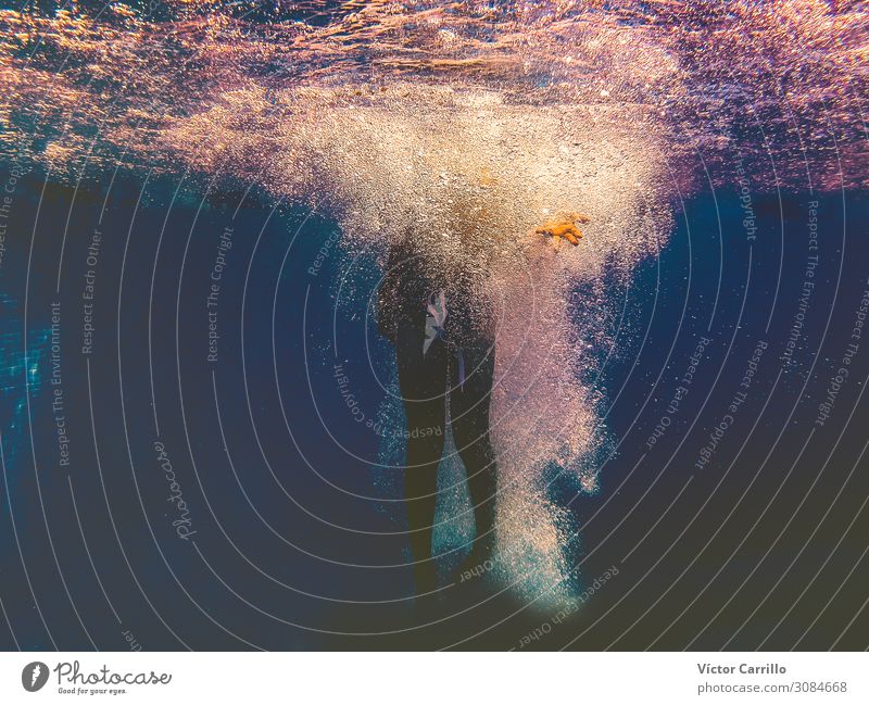 Underwater photography. A boy splashing in a pool Swimming pool Human being Boy (child) Young man Youth (Young adults) Body 1 8 - 13 years Child Infancy