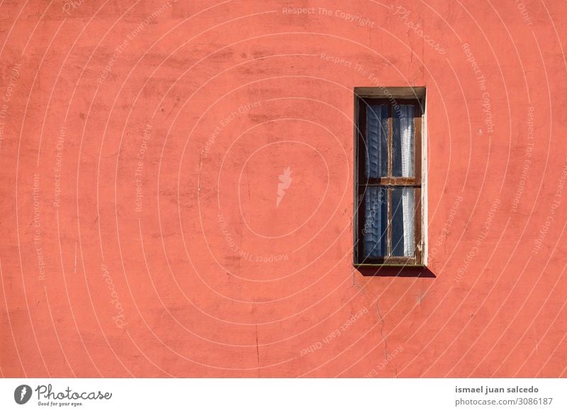 window on the red facade of the building in the city Window Red Facade Building Exterior shot Balcony House (Residential Structure) Home Street City Colour