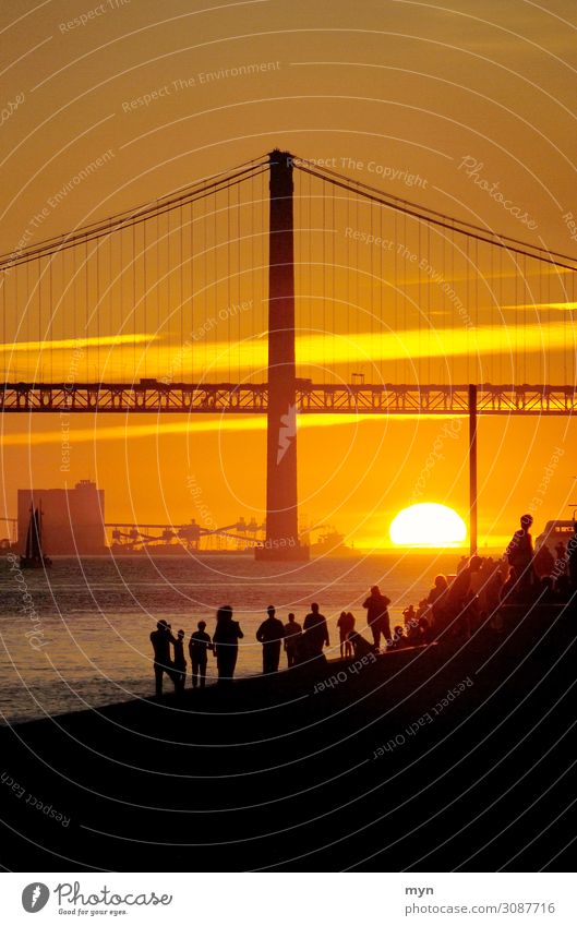 Sunset behind the bridge on the Tagus River in Lisbon Portugal Bridge Back-light Vacation & Travel Sunlight Evening Twilight Tourism Summer Contrast Silhouette