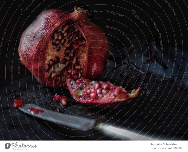 Who was the killer Food Fruit Pomegranate Knives Pink Red Colour photo Interior shot Studio shot Isolated Image Neutral Background Artificial light Low-key