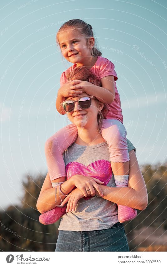 Sisters enjoying piggyback ride Lifestyle Joy Happy Relaxation Leisure and hobbies Vacation & Travel Trip Freedom Summer Summer vacation Child Human being Girl