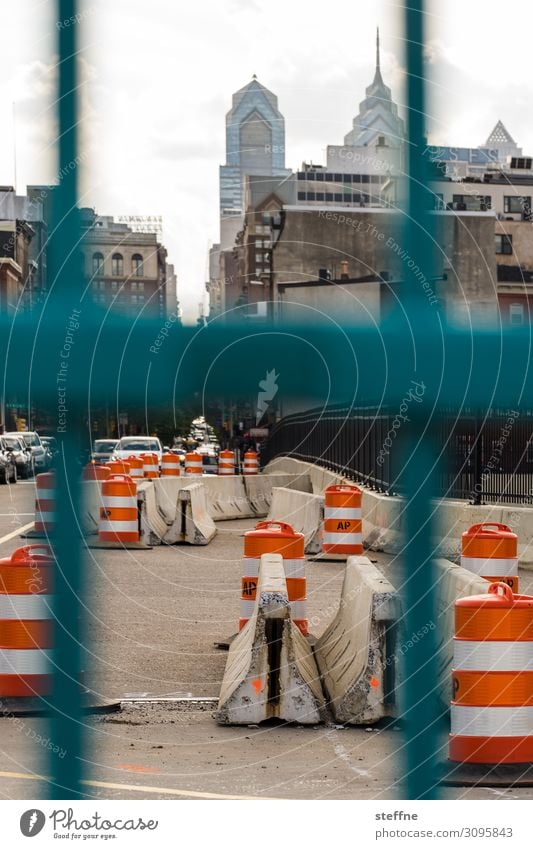 vertical Downtown Skyline High-rise Transport Street Crossroads Town Barrier Roadblock Construction site Fence Traffic cone Philadelphia USA Colour photo