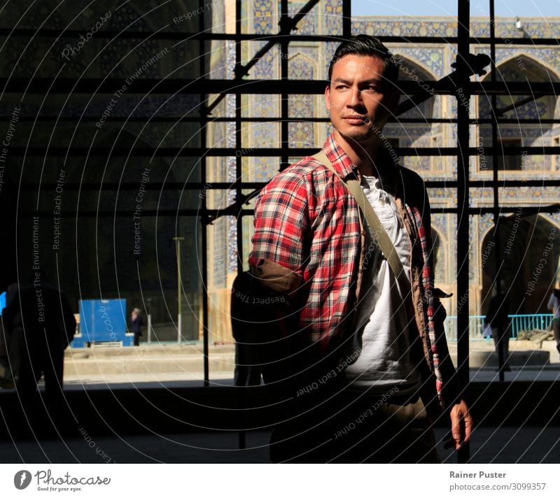 Young man standing in sunlight in Iranian mosque Style Hair and hairstyles Life Masculine Youth (Young adults) Man Adults 1 Human being 30 - 45 years Shiraz