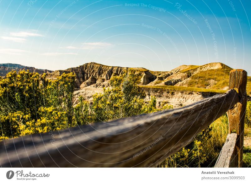 wooden fence by the canyon in Badlands National Park , SD , USA Hiking Plant Earth Sand Grass Hill Rock Driving Tall Colour Formation Cliff Pebble