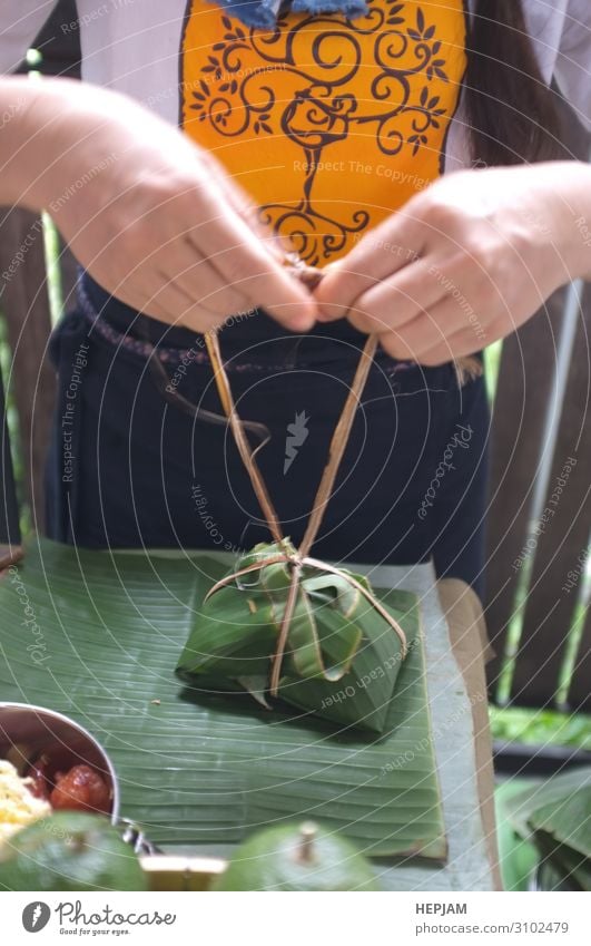 The woman use of natural materials Dessert Bowl Table Man Adults Family & Relations Culture Environment Nature Plant Leaf Packaging Package Observe Authentic