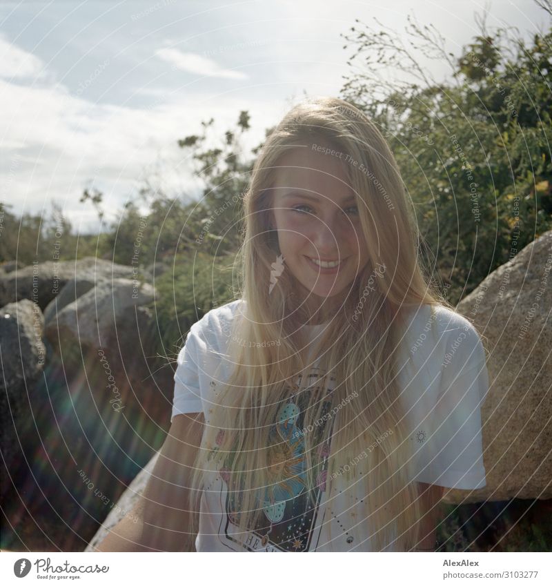 Backlit portrait of a young, smiling woman Joy Life Well-being Summer Summer vacation Sun Sunbathing Young woman Youth (Young adults) 18 - 30 years Adults