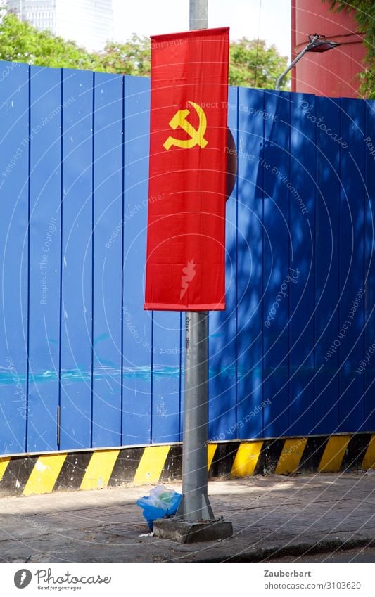 hammer and sickle on red and blue Saigon Vietnam Wall (barrier) Wall (building) Flag Flagpole Sign Sharp-edged Blue Red Honor Solidarity Stupid Force Precision