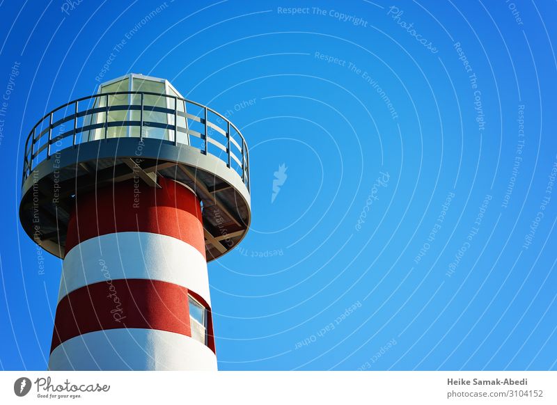 Section of a lighthouse Sky Tower Lighthouse Manmade structures Maritime Blue Red White Nautical Navigation Isolated Image Colour photo Copy Space right