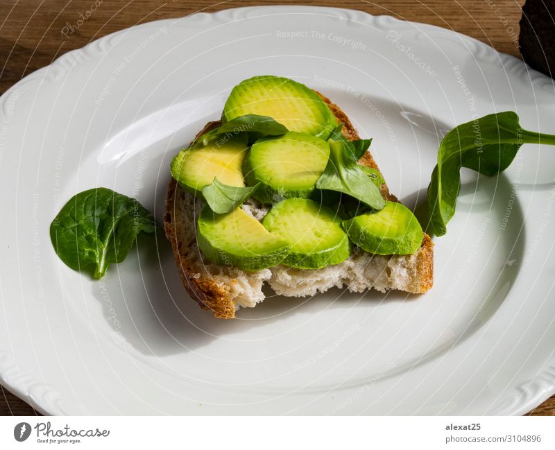 Avocado toast in a plate Vegetable Fruit Bread Nutrition Breakfast Lunch Vegetarian diet Fresh Natural Green appetizer avocado background brunch food Gourmet