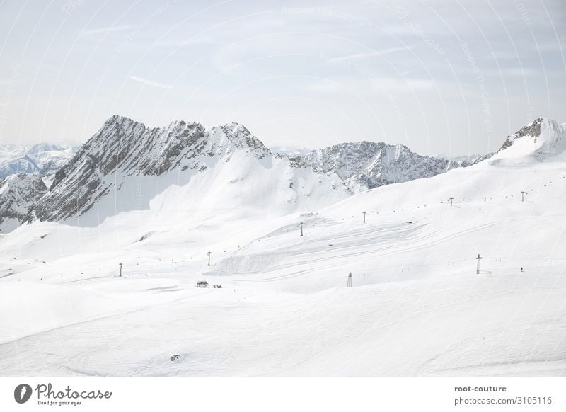 Ski area with snow-covered mountains in the background Vacation & Travel Winter Snow Winter vacation Mountain Christmas & Advent Sports Skiing Skis Snowboard