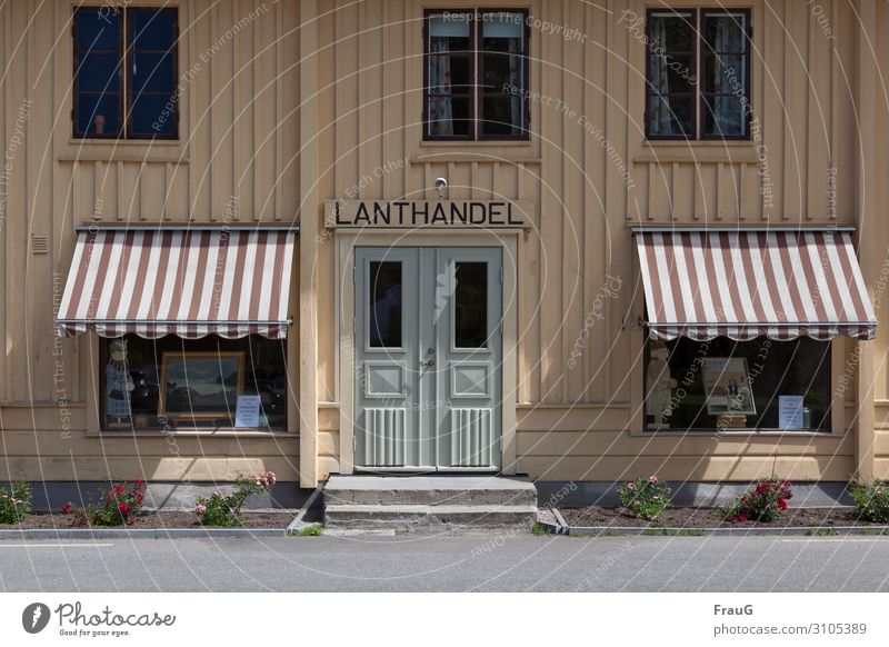 land trade Shopping Kristianopel Sweden Northern Europe House (Residential Structure) Facade Shop window Sun blind Street Wood Nostalgia Junk shop Light Shadow