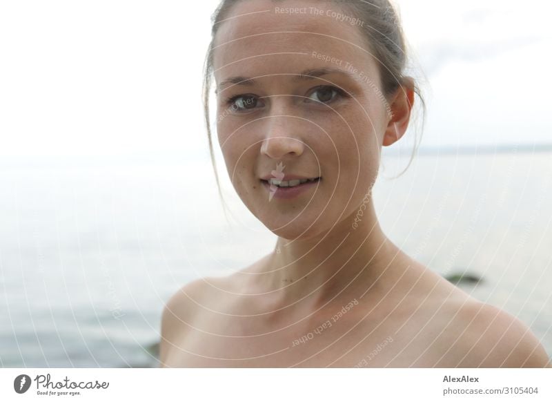 Portrait of a young woman at the sea Joy already Wellness Life Summer Summer vacation Beach Ocean Young woman Youth (Young adults) Face 18 - 30 years Adults