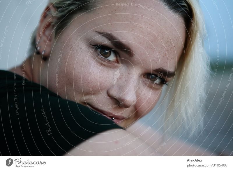 Lateral portrait of a young woman with freckles Joy pretty Life Harmonious Young woman Youth (Young adults) Face Freckles 18 - 30 years Adults Beautiful weather