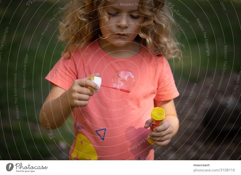 soap bubbles Girl Soap bubble Close-up Macro (Extreme close-up) Blow Child Toddler Playing Portrait photograph To swing Infancy Happy Discover Childlike