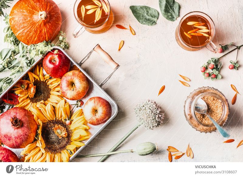 sunflowers, pumpkin, apples, flowers and herbal tea Food Vegetable Fruit Nutrition Beverage Hot drink Tea Cup Style Design Healthy Eating Summer Autumn Flower