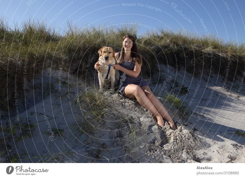 Blond Labrador and young woman on the beach Lifestyle Style Joy already Harmonious Summer Summer vacation Sun Sunbathing Beach Young woman Youth (Young adults)