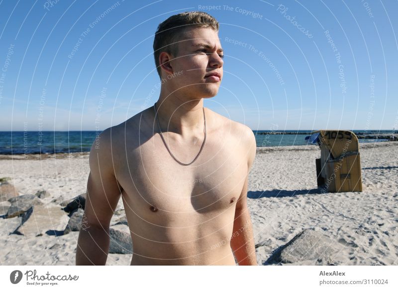 Portrait of a young, sporty man with free upper body on the beach Lifestyle Style Joy already Summer Summer vacation Sun Sunbathing Ocean Young man