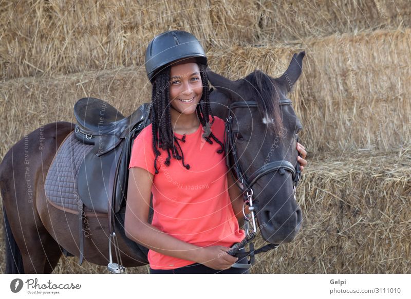 Beautiful teenager with his horse learning to ride Lifestyle Happy Leisure and hobbies Vacation & Travel Summer Child School Woman Adults Friendship Landscape