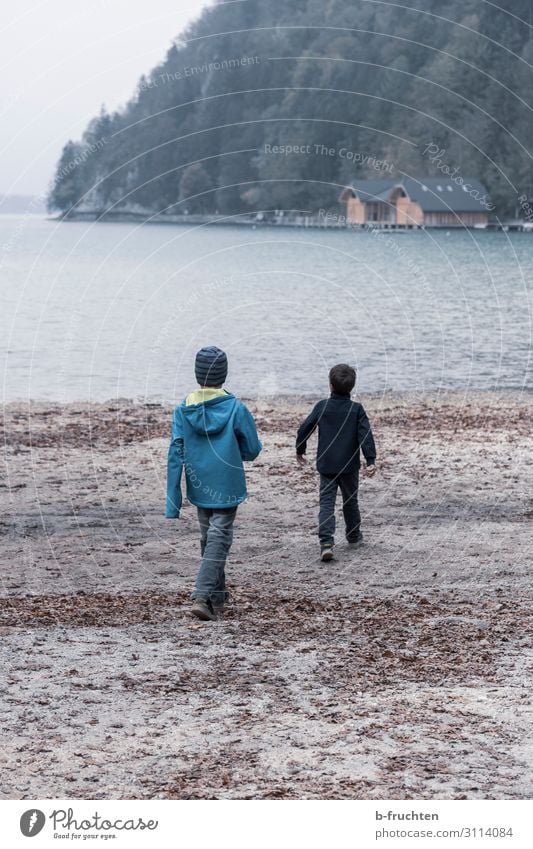 Two children on the lake shore Joy Harmonious Well-being Leisure and hobbies Playing Trip Adventure Freedom Hiking Child 2 Human being Clouds Autumn Bad weather