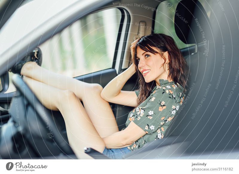 Woman resting in a white car pulling her feet out the window. Lifestyle Joy Happy Beautiful Relaxation Leisure and hobbies Vacation & Travel Trip Human being