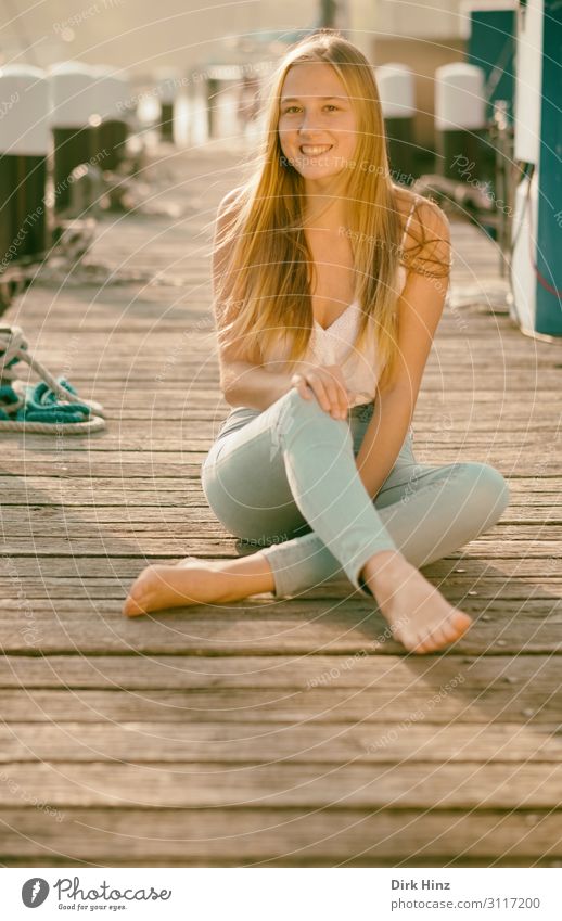 Young woman on jetty Joy Summer Feminine Girl Sister Family & Relations Friendship 1 Human being 18 - 30 years Youth (Young adults) Adults Harbour Love Maritime