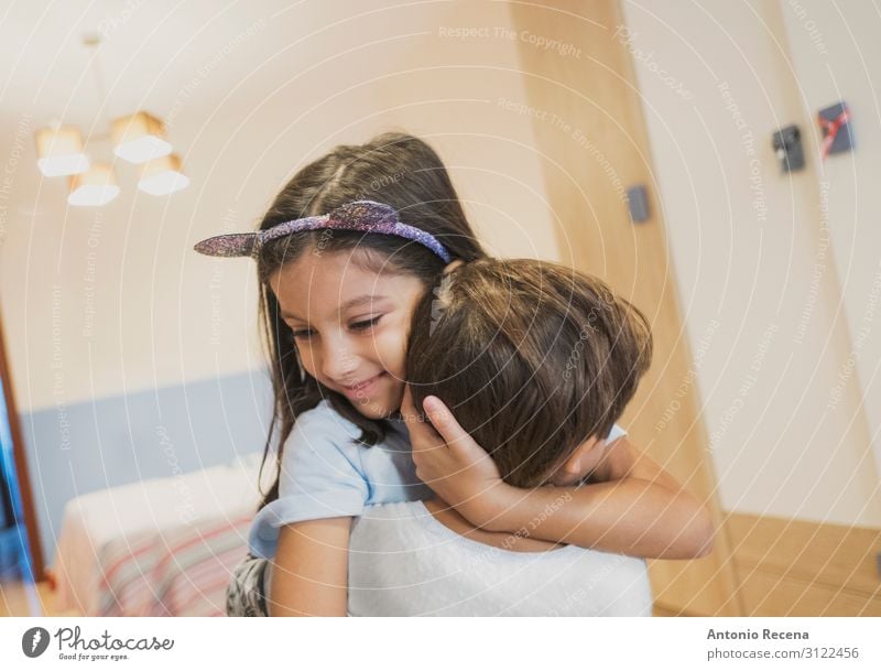 Brothers hugging in the bedroom of their house Lifestyle Flat (apartment) Bedroom Child Boy (child) Sister Family & Relations Infancy Smiling Love Embrace