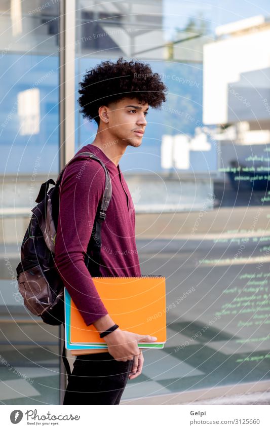 African teen student in the university with afro hair Happy School Academic studies Human being Boy (child) Man Adults Youth (Young adults) Smiling Black