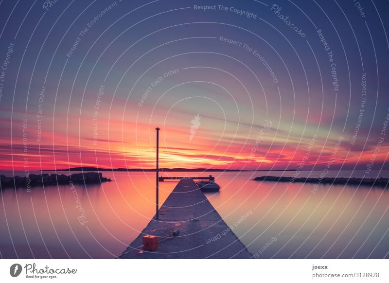 Long jetty by the sea at intense sunset Sunset Footbridge Ocean Beautiful weather Summer tranquillity Evening Exterior shot Colour photo relaxation Twilight