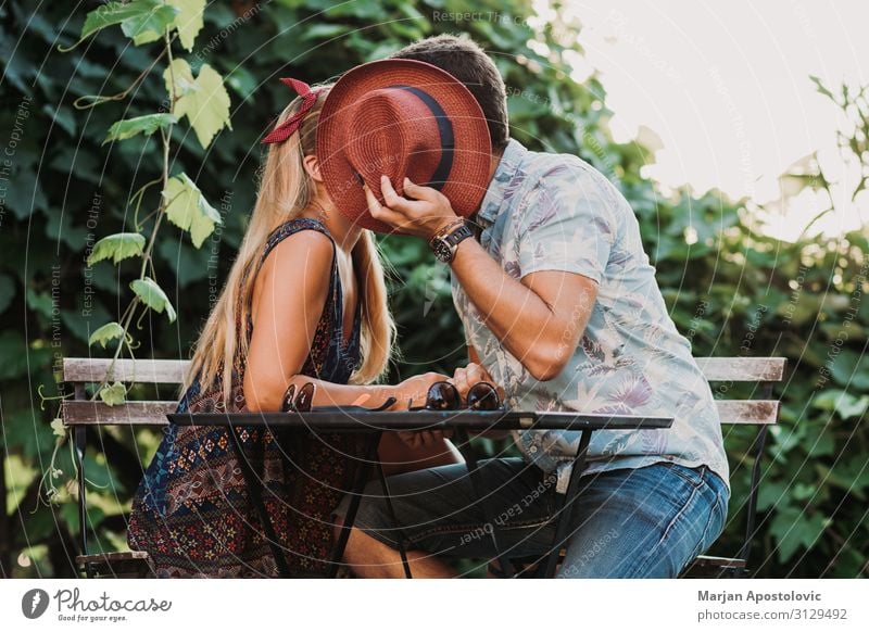 Couple in love kissing on the terrace Lifestyle Joy Vacation & Travel Valentine's Day Masculine Feminine Young woman Youth (Young adults) Young man Woman Adults