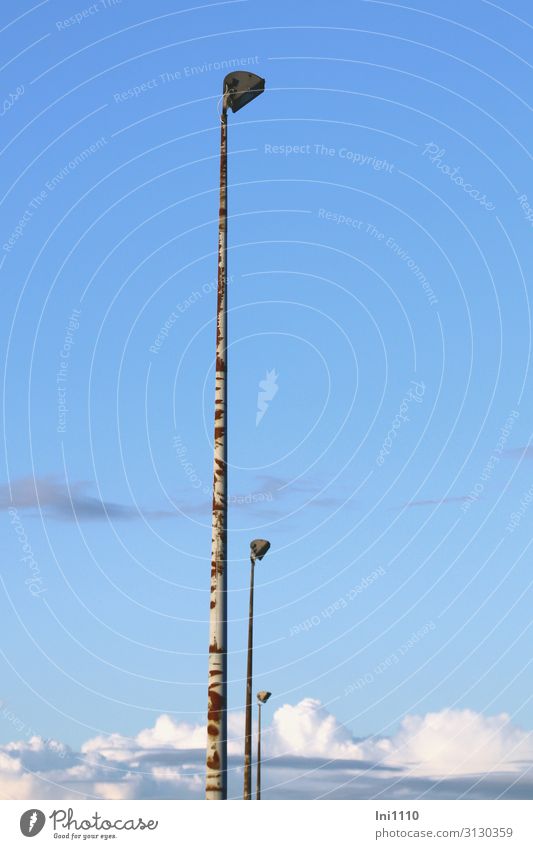 Floodlight with clouds Technology Advancement Future Energy industry Nature Clouds Autumn Beautiful weather Blue Brown Gray Black White Sporting grounds